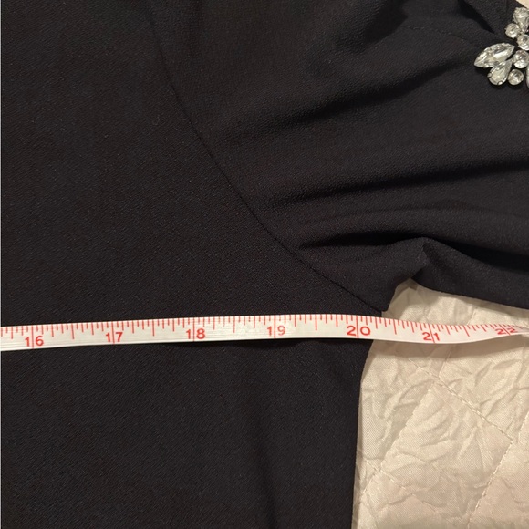 Black polyester/spandex blend, with embellished sleeves. - Picture 7 of 9